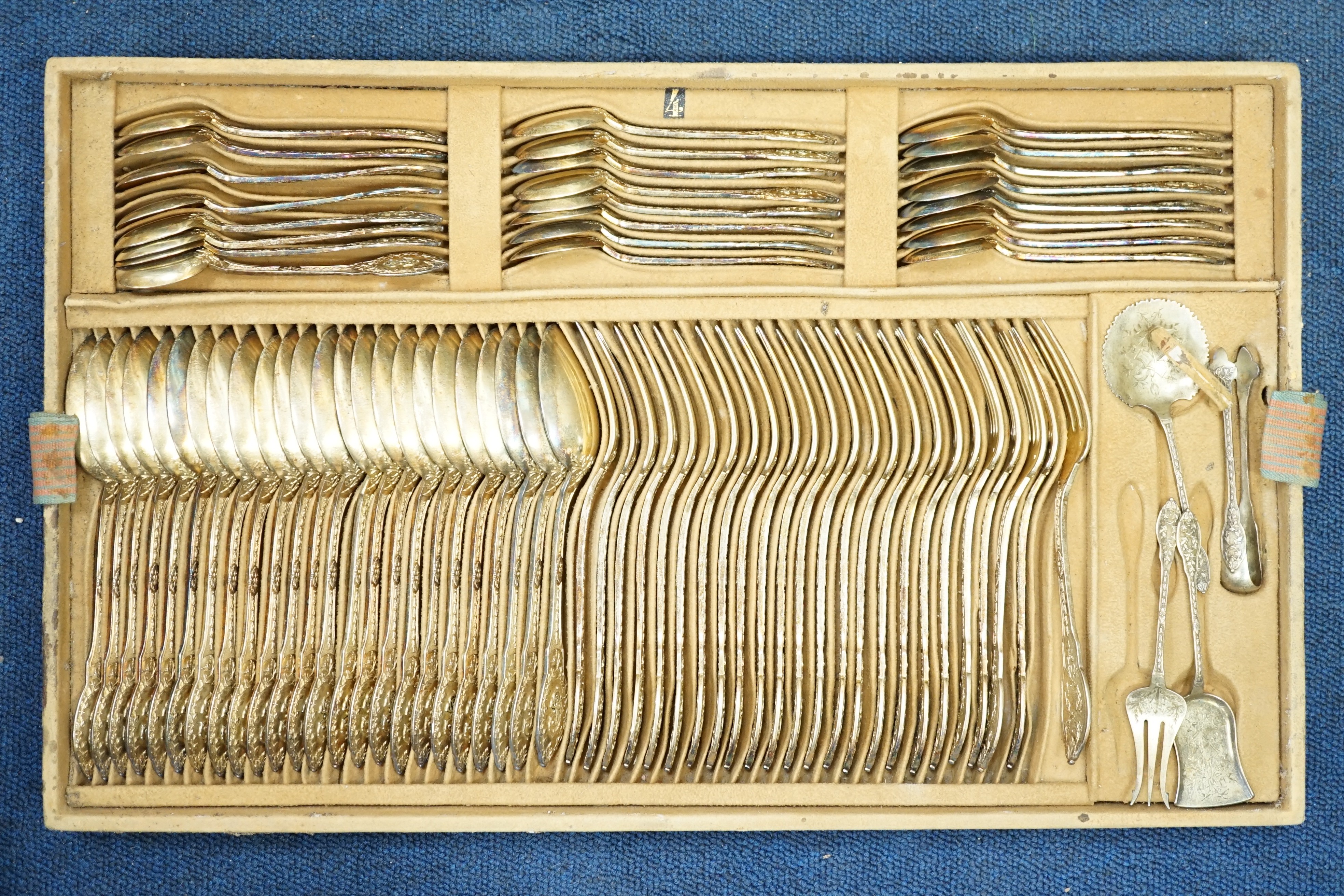 An extensive, almost complete canteen of late 19th/early 20th century French 950 standard silver fancy pattern cutlery, mainly by Gustave Keller of Paris